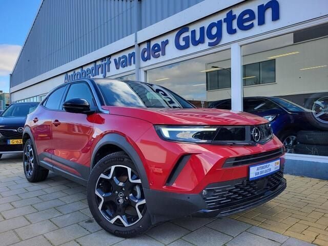 Rood, metallic lak Gebruikt 2024 Opel Mokka Ultimate SUV | € 26.950 (Eerlijke prijs) - Afbeelding 1/4