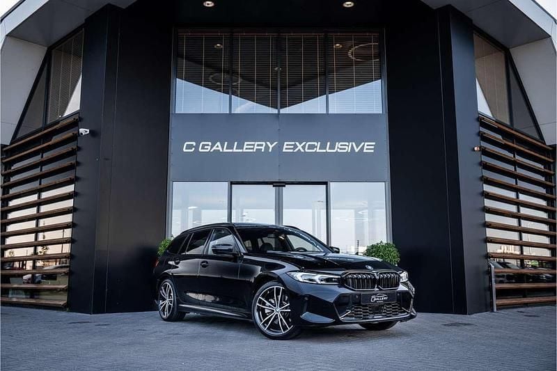 Zwart Gebruikt 2024 BMW 330e M Sport Stationwagen | € 51.495 (Goede deal) - Afbeelding 1/4