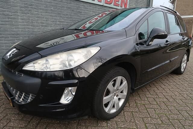 Zwart Gebruikt 2009 Peugeot 308 SW Stationwagen | € 2.913 (Eerlijke prijs) - Afbeelding 1/4