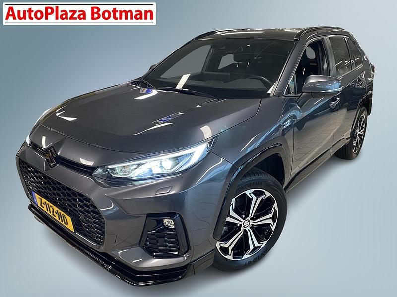 Grijs Gebruikt 2024 Suzuki Across Style SUV | € 46.950 - Afbeelding 1/4