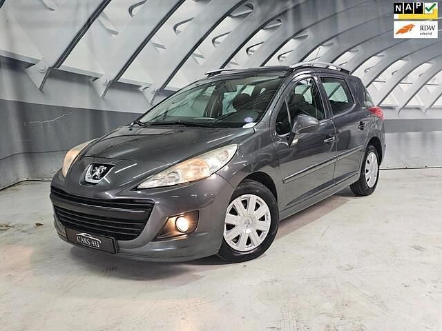 Grijs Gebruikt 2011 Peugeot 207 Access Stationwagen | € 2.999 (Eerlijke prijs) - Afbeelding 1/4