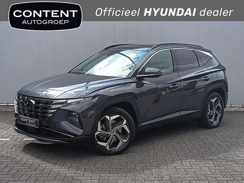Grijs metallic Gebruikt 2022 Hyundai Tucson Premium SUV | € 33.940 (Eerlijke prijs) - Afbeelding 1/4