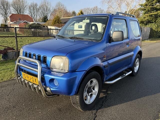 Blauw (metallic) Occasion 2005 Suzuki Jimny SUV | € 6.450 (Goede deal) - Afbeelding 1/4