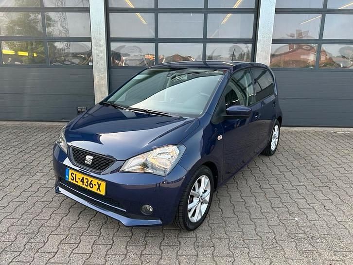 Blauw, metallic lak Gebruikt 2018 Seat Mii Ecomotive Hatchback | € 8.435 (Eerlijke prijs) - Afbeelding 1/4