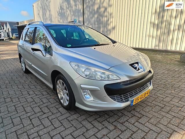 Grijs (metallic) Gebruikt 2008 Peugeot 308 SW Stationwagen | € 1.950 (Goede deal) - Afbeelding 1/4