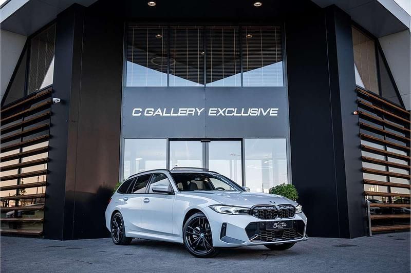Grijs Gebruikt 2024 BMW 330e M Sport Stationwagen | € 51.495 (Goede deal) - Afbeelding 1/4