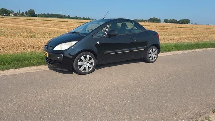 Zwart Gebruikt 2007 Mitsubishi Colt Invite Cabriolet | € 1.995 (Goede deal) - Afbeelding 1/4