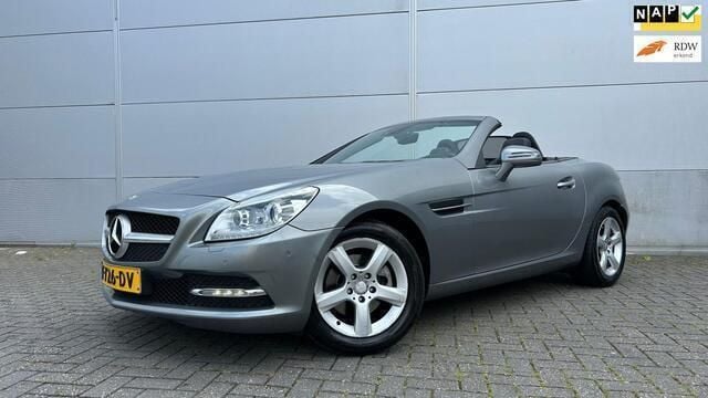 Grijs Gebruikt 2014 Mercedes SLK200 Cabriolet | € 15.950 (Eerlijke prijs) - Afbeelding 1/4
