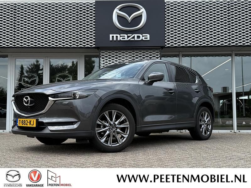 Machine gray metallic (46g) Gebruikt 2019 Mazda CX-5 SUV | € 28.490 (Eerlijke prijs) - Afbeelding 1/2