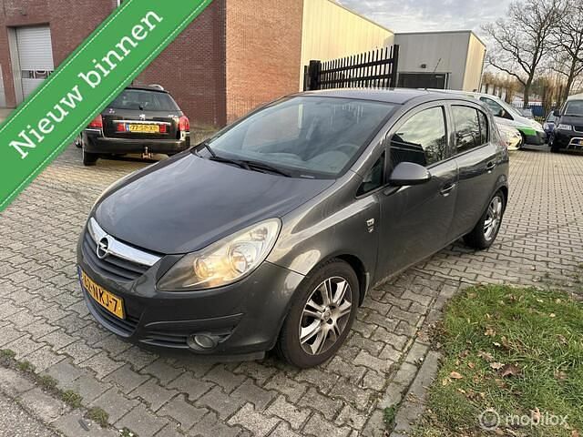 Grijs Occasion 2010 Opel Corsa Hatchback | € 1.650 (Eerlijke prijs) - Afbeelding 1/4