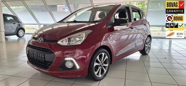 Paars Gebruikt 2014 Hyundai i10 Edition Hatchback | € 6.950 (Eerlijke prijs) - Afbeelding 1/4