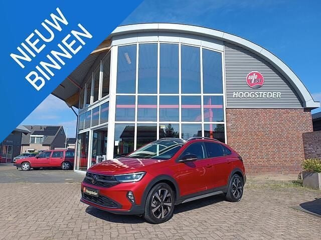 Rood Gebruikt 2022 VW Taigo Style SUV | € 24.450 (Goede deal) - Afbeelding 1/4