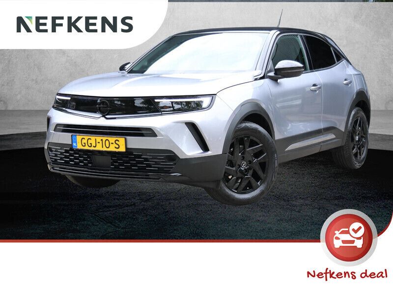 Grijs Gebruikt 2024 Opel Mokka SUV | € 28.925 - Afbeelding 1/4