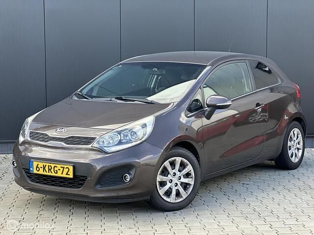 Bruin Gebruikt 2013 Kia Rio Hatchback | € 6.998 (Iets duurder) - Afbeelding 1/4