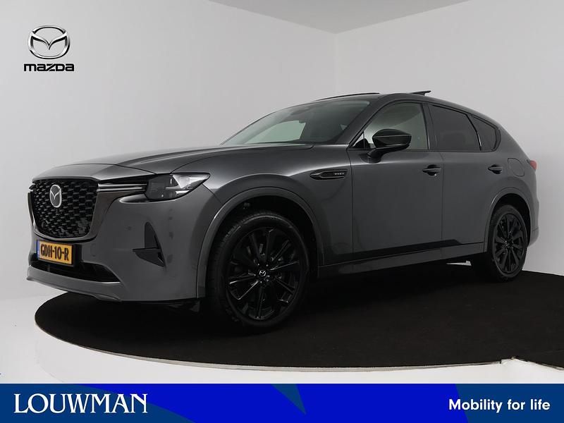 Machine grey (grijs metallic) Gebruikt 2024 Mazda CX-60 Homura-Line SUV | € 51.895 (Duur) - Afbeelding 1/3