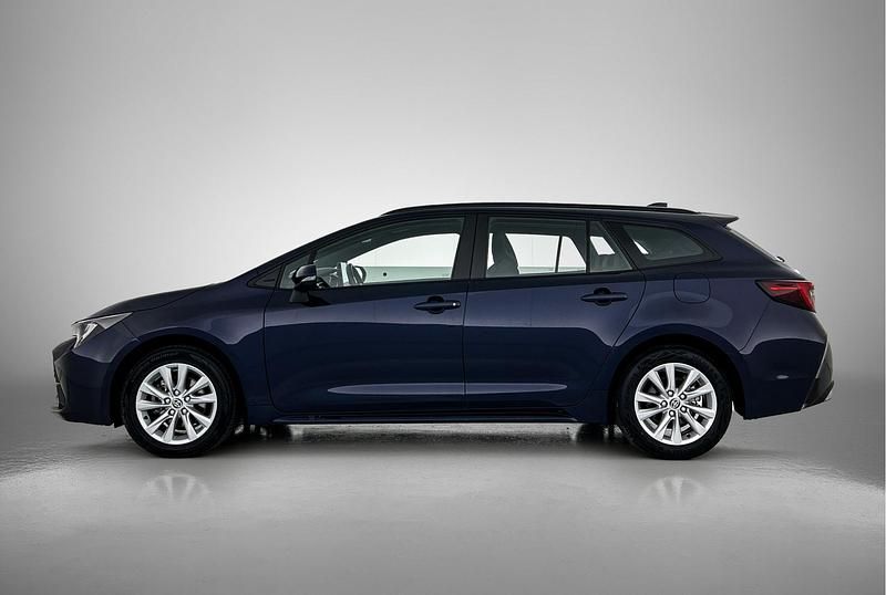 Occasion Toyota Corolla Hybrid Active 2024 Blauw Stationwagen