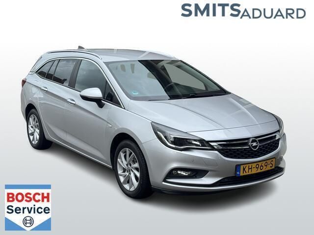 Grijs Gebruikt 2016 Opel Astra Business Stationwagen | € 8.999 (Duur) - Afbeelding 1/4