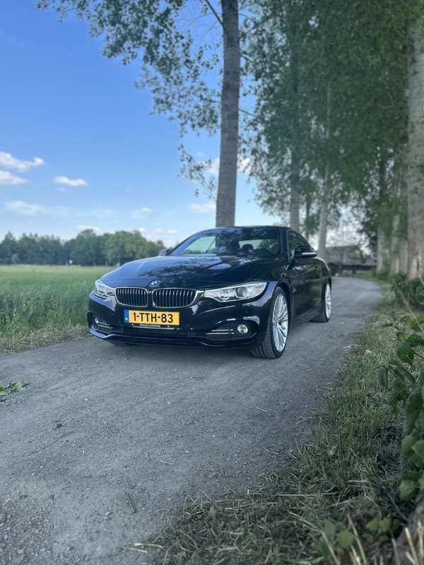 Zwart Gebruikt 2014 BMW 428 Executive Cabriolet | € 16.428 (Eerlijke prijs) - Afbeelding 1/4