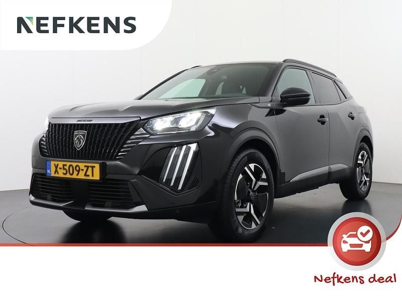 Zwart, metallic lak Gebruikt 2024 Peugeot e-2008 Allure SUV | € 28.925 (Eerlijke prijs) - Afbeelding 1/4