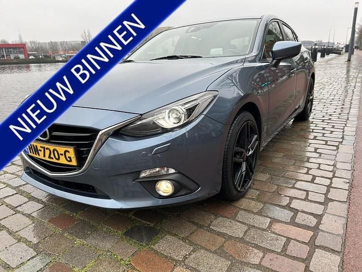 Blauw (metallic) Occasion 2015 Mazda 3 Hatchback | € 9.950 (Eerlijke prijs) - Afbeelding 1/4