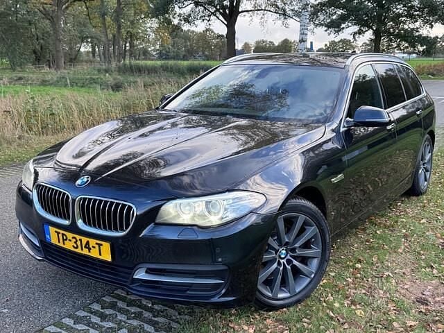 Zwart Gebruikt 2014 BMW 520 Executive Stationwagen | € 7.750 (Goede deal) - Afbeelding 1/4