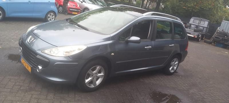 Grijs Gebruikt 2006 Peugeot 307 Stationwagen | € 1.695 (Eerlijke prijs) - Afbeelding 1/4