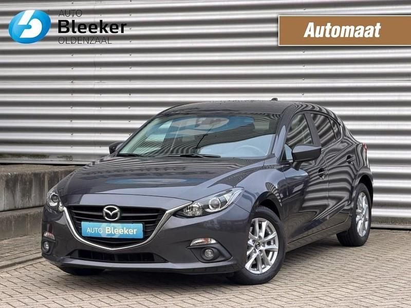 Grijs (metallic) Gebruikt 2014 Mazda 3 Hatchback | € 11.950 (Eerlijke prijs) - Afbeelding 1/4