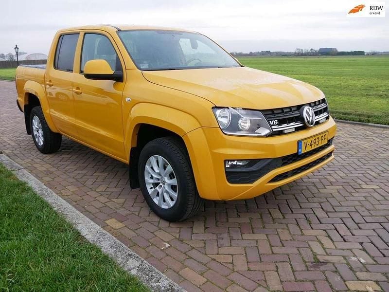 Geel Gebruikt 2018 VW Amarok Comfortline Pickup | € 12.999 (Goede deal) - Afbeelding 1/3
