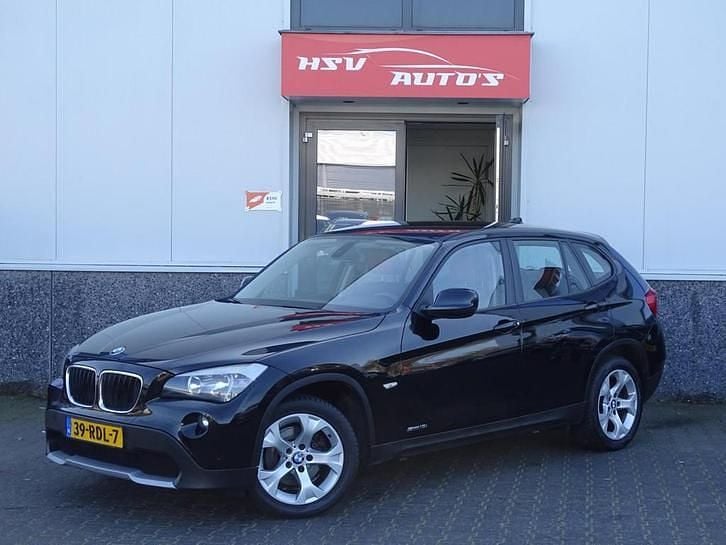 Zwart Gebruikt 2011 BMW X1 Executive SUV | € 6.499 (Goede deal) - Afbeelding 1/3