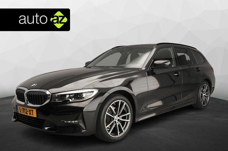Zwart Gebruikt 2021 BMW 318 Sport Line Stationwagen | € 23.900 (Eerlijke prijs) - Afbeelding 1/4