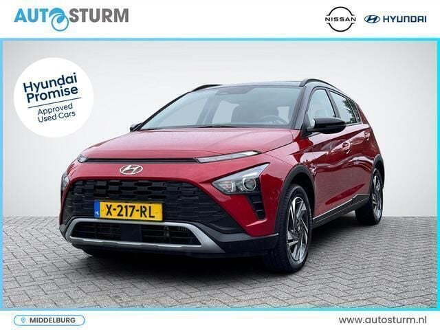 Rooddragon red + zwart dak Gebruikt 2024 Hyundai Bayon Comfort SUV | € 21.380 (Eerlijke prijs) - Afbeelding 1/4