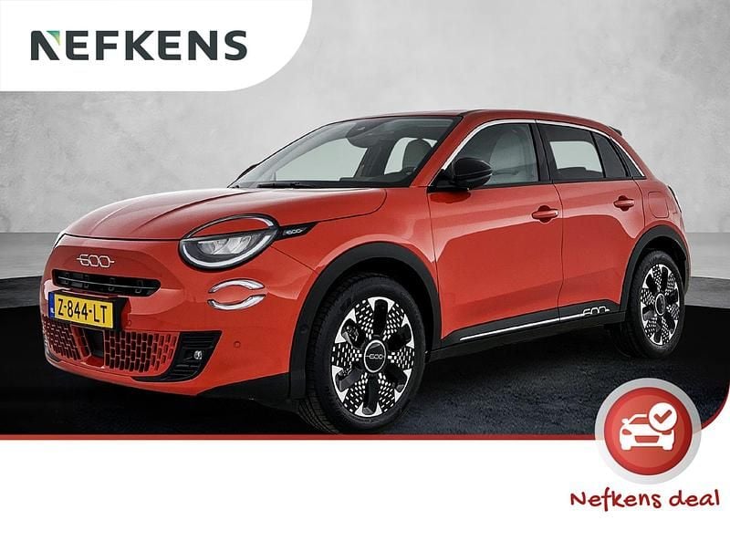 Oranje Gebruikt 2024 Fiat 600E La Prima SUV | € 26.425 (Eerlijke prijs) - Afbeelding 1/3