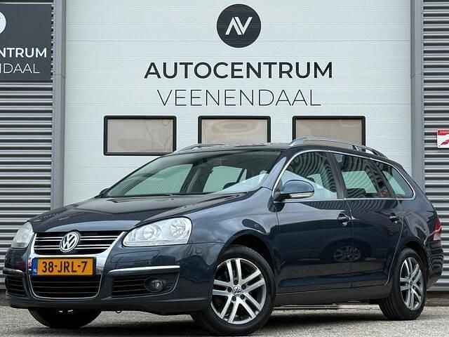 Grijs (metallic) Gebruikt 2009 VW Golf VI Highline Stationwagen | € 2.450 (Goede deal) - Afbeelding 1/4