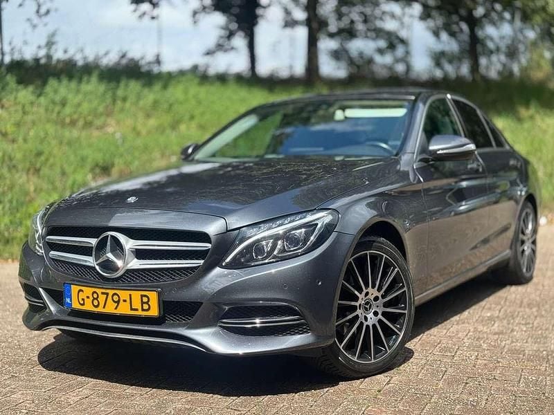 Grijs Occasion 2015 Mercedes C180 Prestige Sedan | € 14.950 (Goede deal) - Afbeelding 1/4