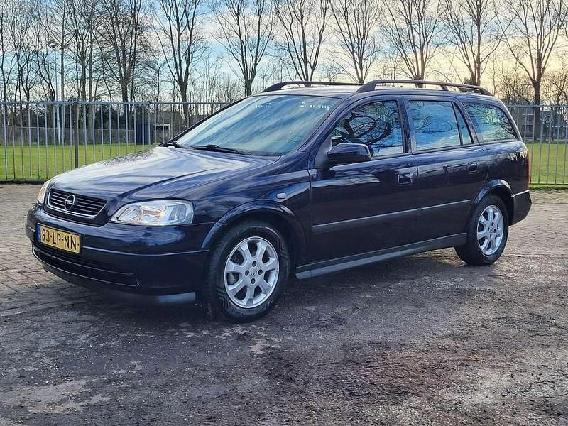 Paars Gebruikt 2003 Opel Astra Njoy Stationwagen | € 599 (Goede deal) - Afbeelding 1/4
