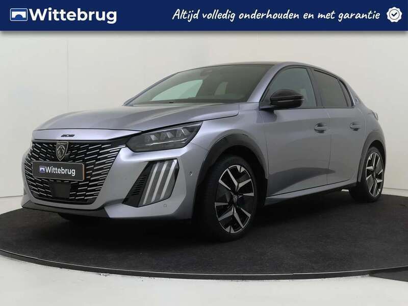 Grijs Gebruikt 2024 Peugeot e-208 GTi Hatchback | € 26.925 - Afbeelding 1/3