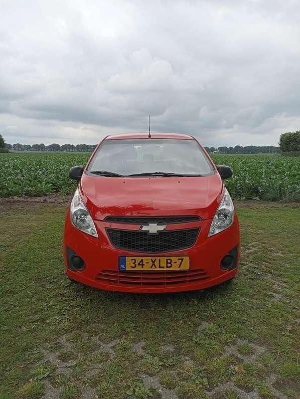 Rood Gebruikt 2012 Chevrolet Spark LS Hatchback | € 3.950 (Iets duurder) - Afbeelding 1/4