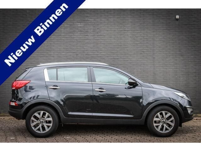 Zwart Gebruikt 2015 Kia Sportage SUV | € 14.950 (Eerlijke prijs) - Afbeelding 1/3
