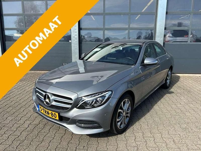 Grijs Gebruikt 2014 Mercedes C180 Ambition Sedan | € 18.835 (Eerlijke prijs) - Afbeelding 1/4