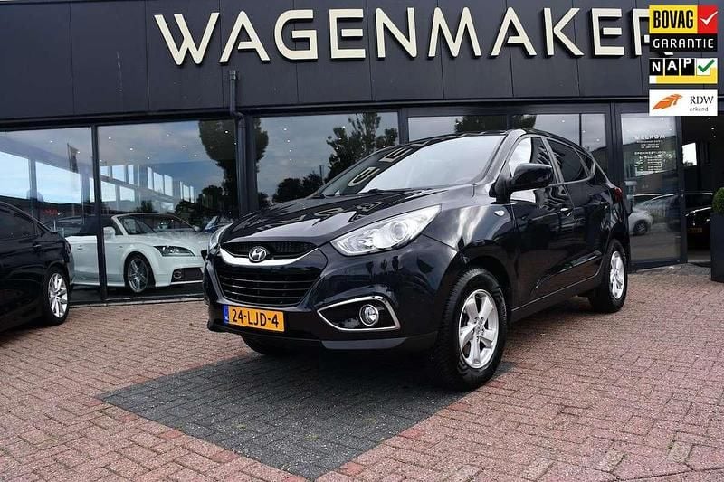 Zwart Gebruikt 2010 Hyundai ix35 Dynamiq SUV | € 7.450 (Eerlijke prijs) - Afbeelding 1/4