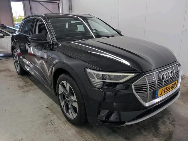 Zwart (metallic) Gebruikt 2020 Audi e-tron S-Line SUV | € 22.990 (Goede deal) - Afbeelding 1/4
