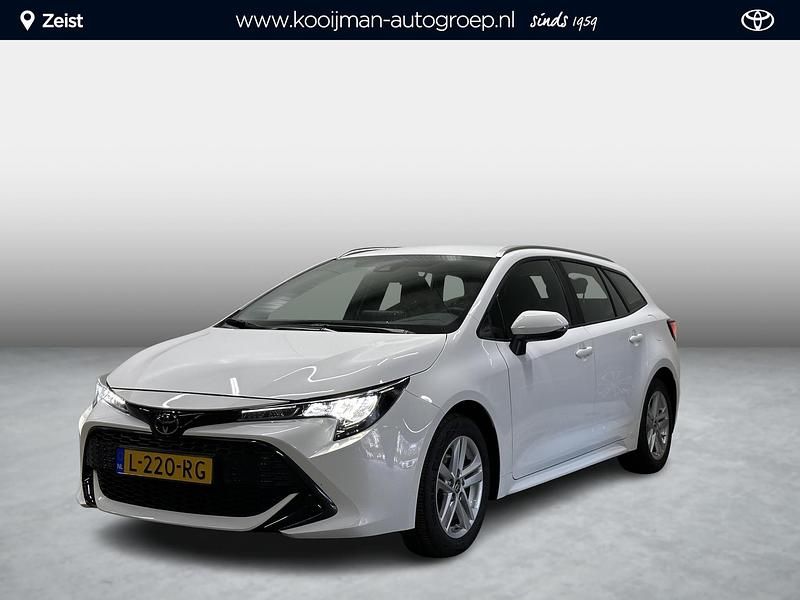 Pure white (licht wit) Gebruikt 2021 Toyota Corolla Active Stationwagen | € 22.150 (Eerlijke prijs) - Afbeelding 1/4