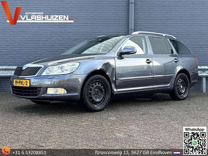 Occasion Skoda Octavia Business Line 105 PK (77 kW) 2011 Grijs Stationwagen