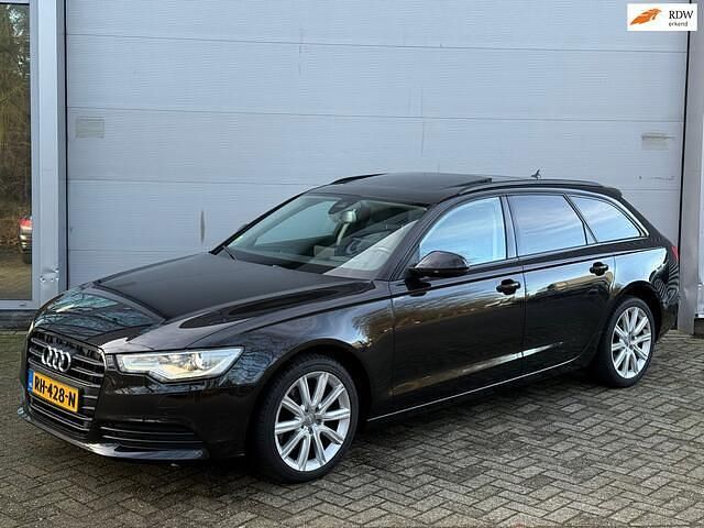 Bruin (metallic) Occasion 2014 Audi A6 Exclusive Stationwagen | € 14.449 (Eerlijke prijs) - Afbeelding 1/4
