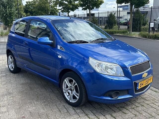 Blauw Gebruikt 2009 Chevrolet Aveo LS Hatchback | € 1.450 (Eerlijke prijs) - Afbeelding 1/4