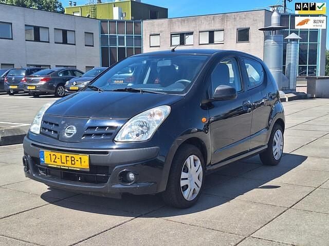 Zwart (metallic) Gebruikt 2010 Nissan Pixo Hatchback | € 1.950 (Goede deal) - Afbeelding 1/4