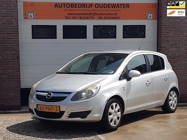 Grijs Gebruikt 2011 Opel Corsa Edition Hatchback | € 1.795 (Goede deal) - Afbeelding 1/4
