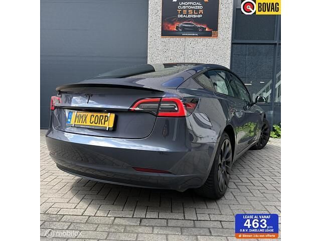 Grijs Gebruikt 2022 Tesla Model 3 Standard Range Sedan | € 28.890 (Eerlijke prijs) - Afbeelding 1/4