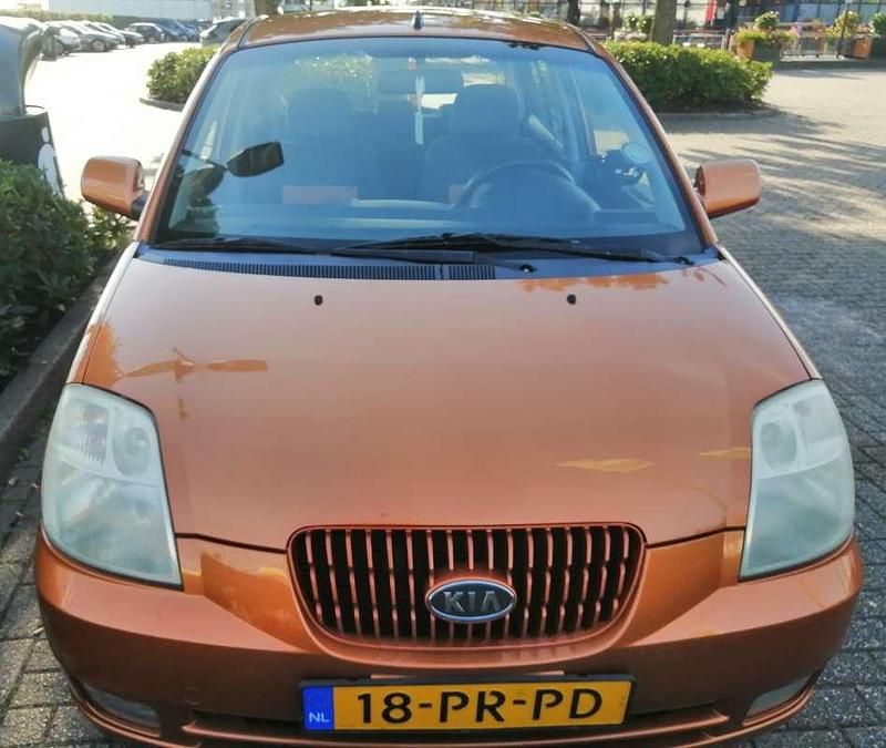 Oranje Occasion 2004 Kia Picanto EX Hatchback | € 640 (Eerlijke prijs) - Afbeelding 1/4