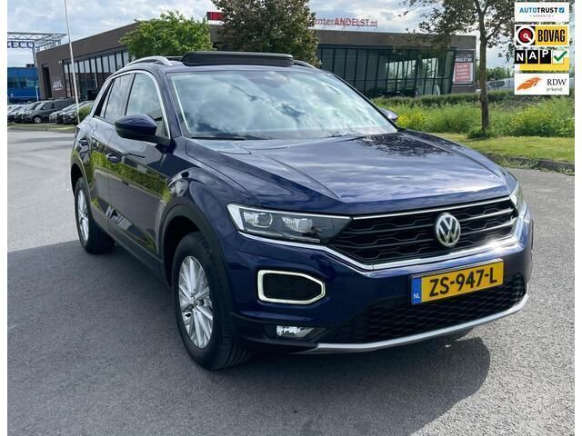 Blauw, metallic lak Gebruikt 2019 VW T-Roc Business SUV | € 24.850 (Eerlijke prijs) - Afbeelding 1/4